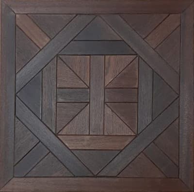 a wooden wall hanging with a square design on it