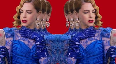 a double image of a woman in a blue dress