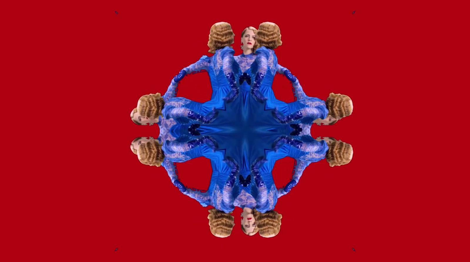 a digital image of a woman in a blue dress