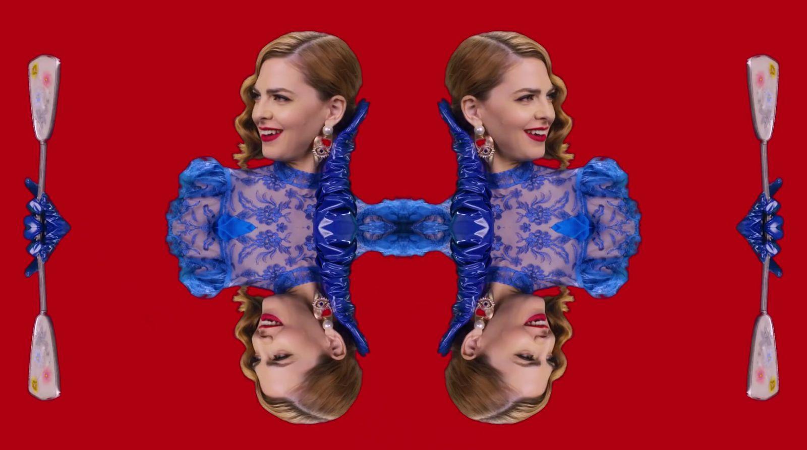 a double image of a woman in a blue dress