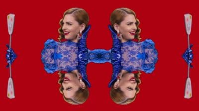 a double image of a woman in a blue dress