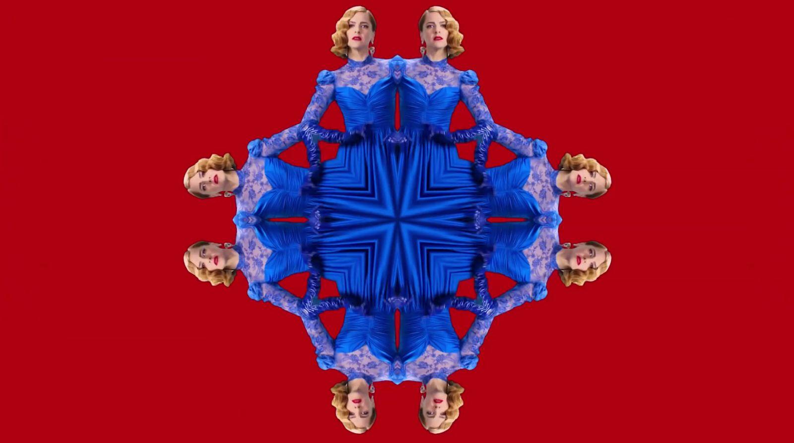 a digital image of a woman in a blue dress