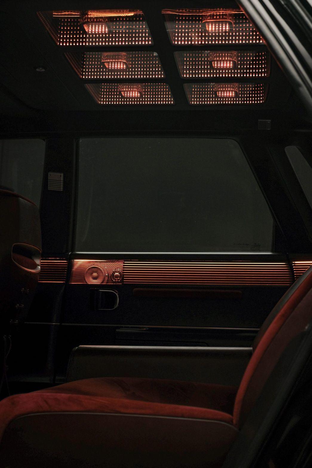 the interior of a vehicle with red lights
