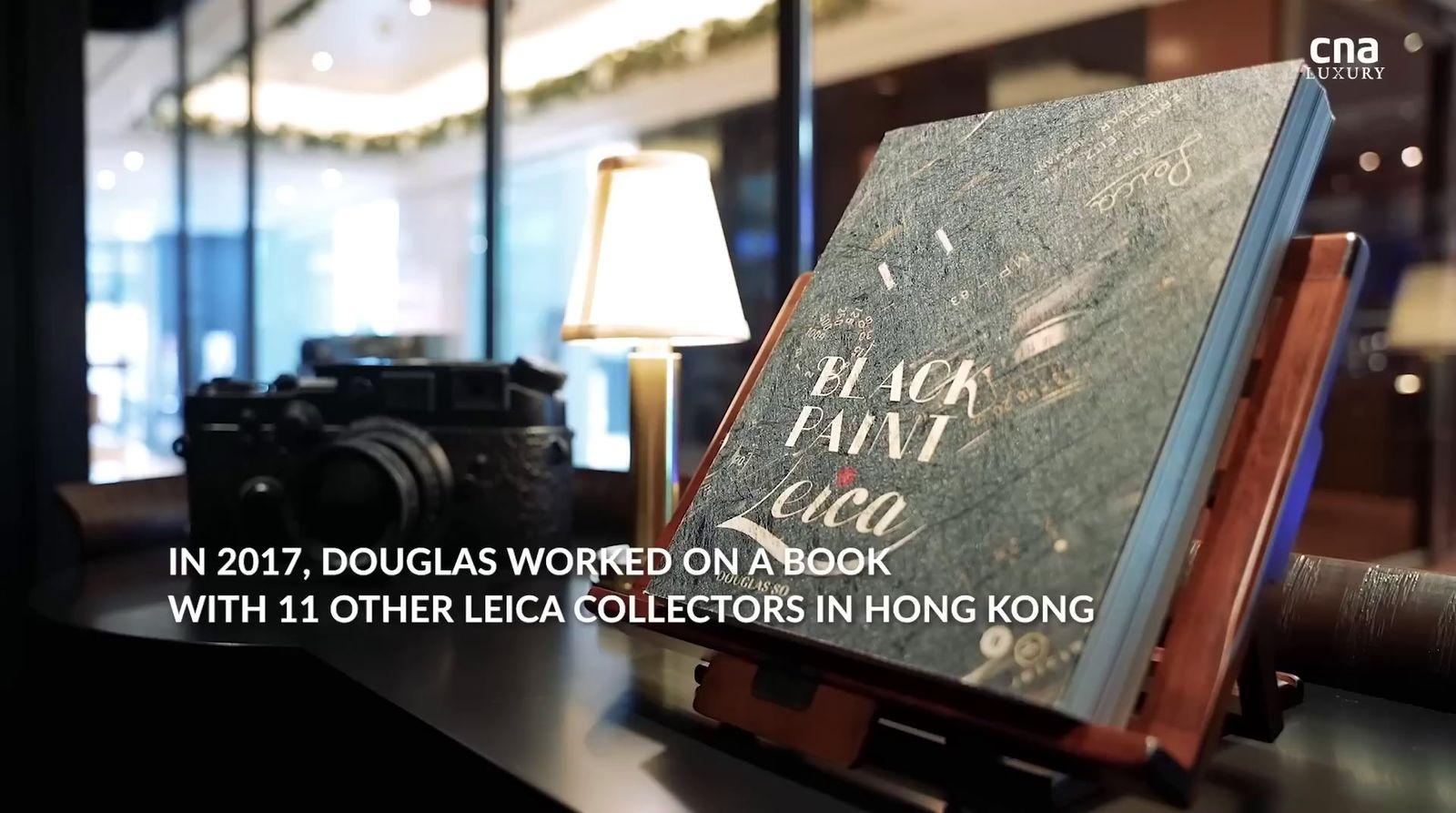 a book sitting on top of a table next to a lamp