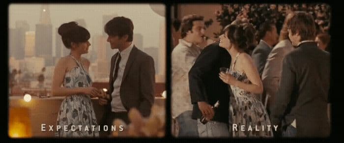 a couple of people standing next to each other