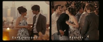 a couple of people standing next to each other