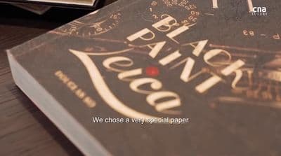 a close up of a book on a table