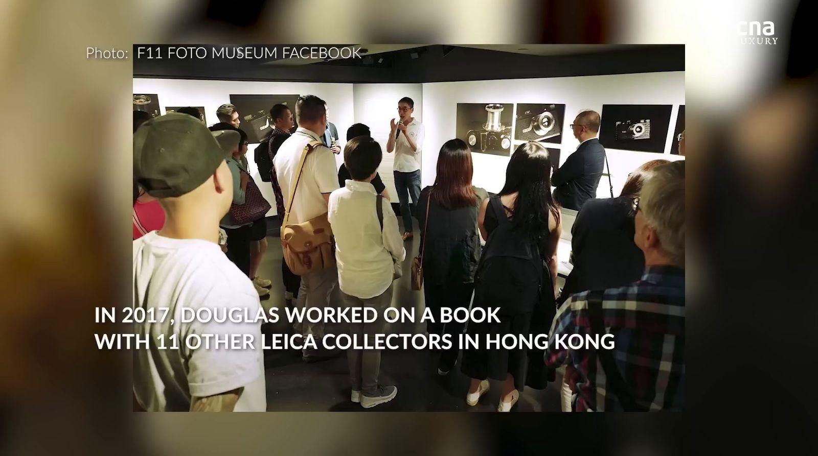 a group of people standing in a room