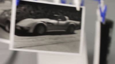 a black and white photo of a car