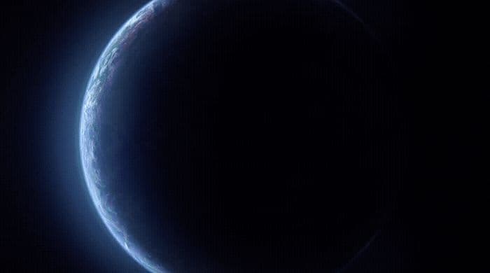 a blue ring in the middle of a black background