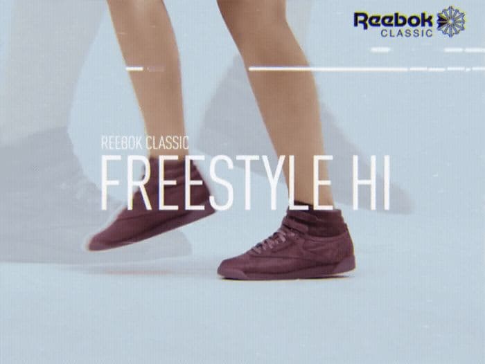 a person's feet in a pair of shoes with the words freestyle classic freestyle