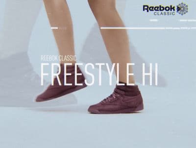 a person's feet in a pair of shoes with the words freestyle classic freestyle