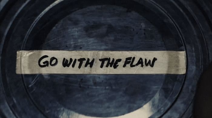 a piece of paper that says go with the flow on it
