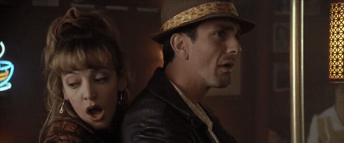 a man and a woman standing next to each other