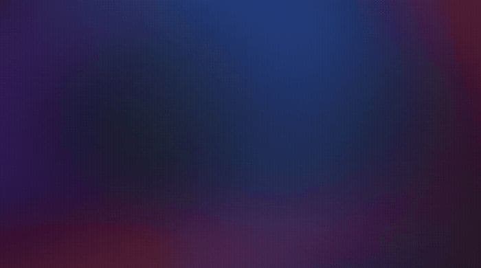 a blurry image of a purple and blue background