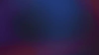 a blurry image of a purple and blue background