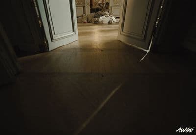 an open door leading to a living room