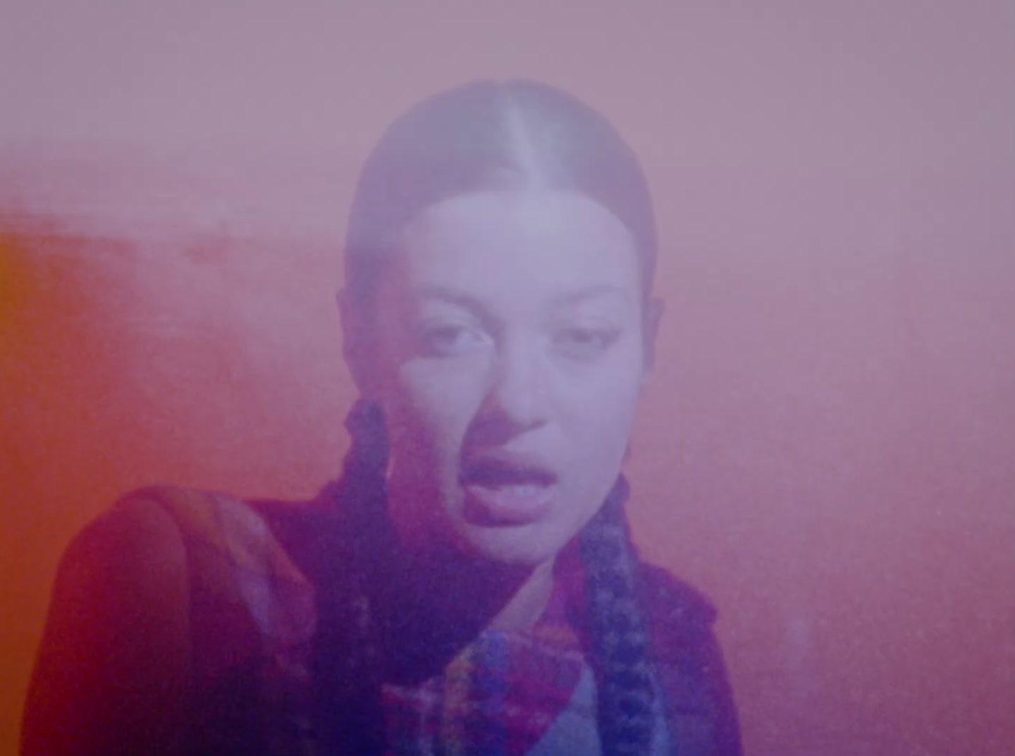 a woman with a surprised look on her face