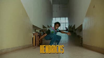 a man is doing a trick on a skateboard
