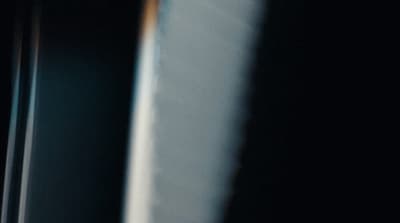 a blurry photo of a person holding a cell phone