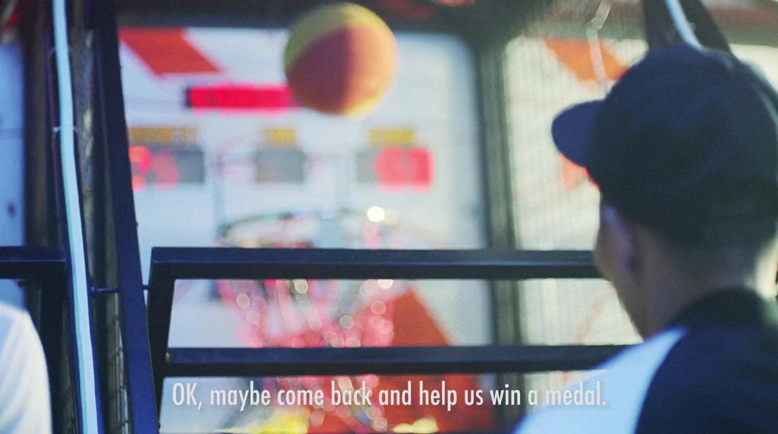 a man sitting on a bus looking out the window