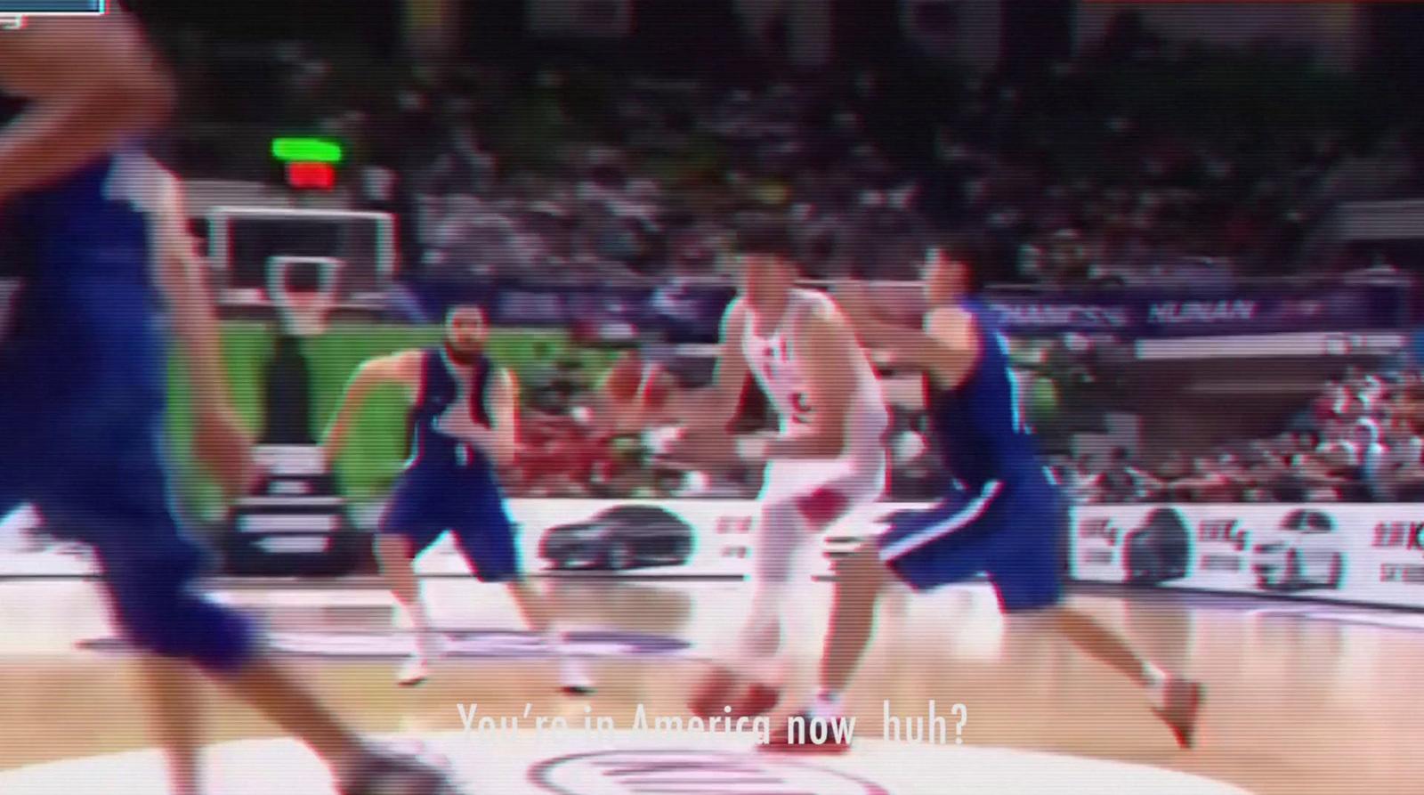 a group of men playing a game of basketball