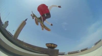 a man flying through the air while riding a skateboard