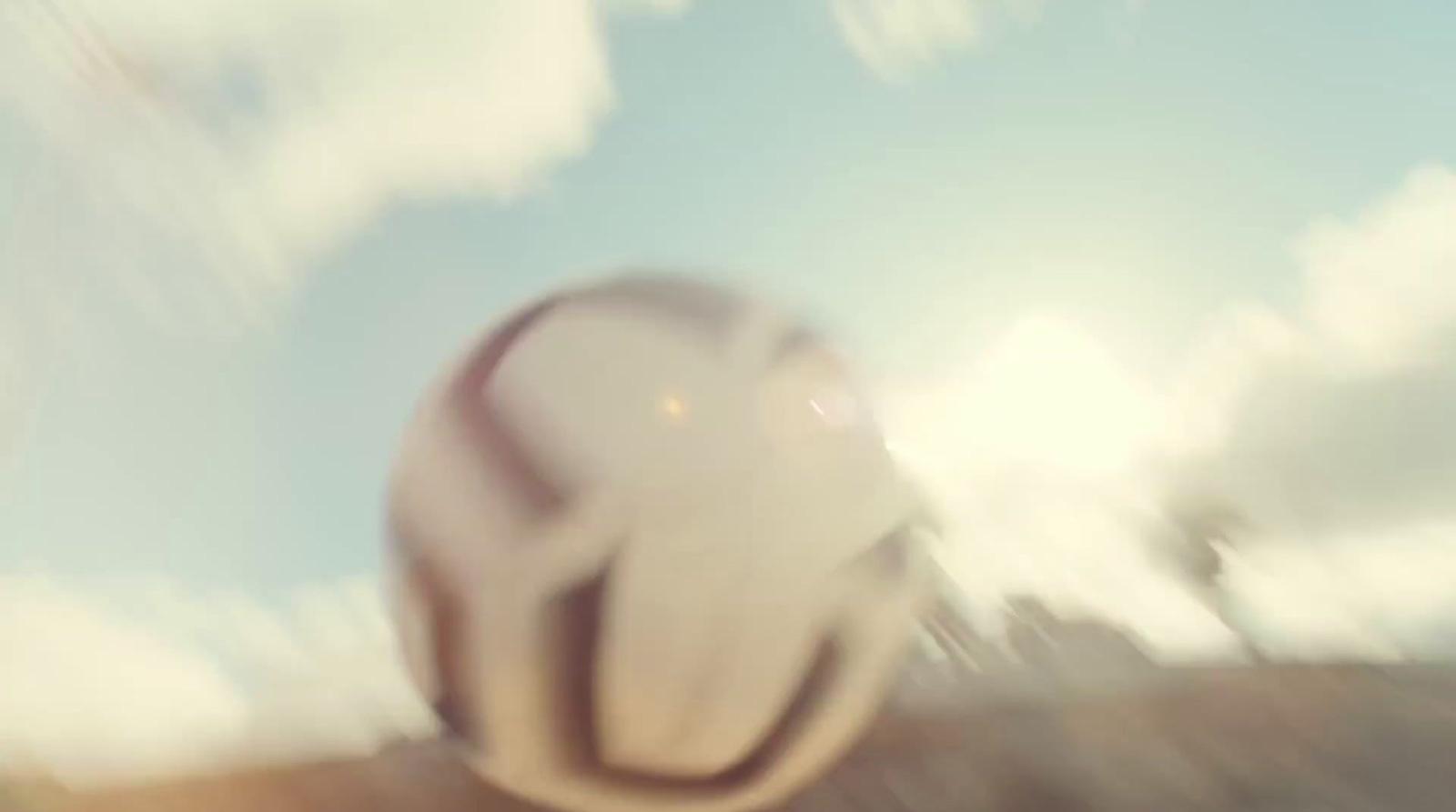 a blurry photo of a soccer ball in the air