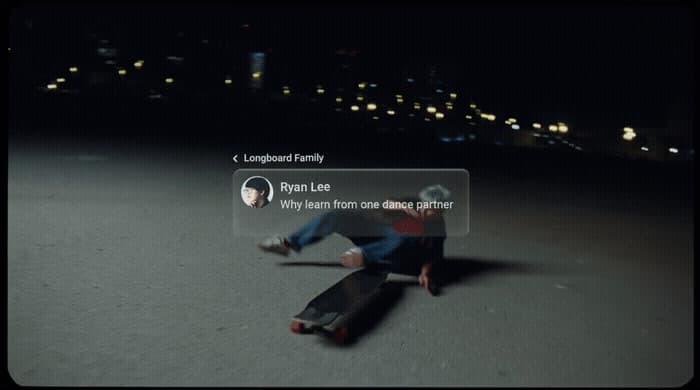 a man riding a skateboard down a street at night