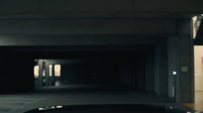 a car is parked in a parking garage