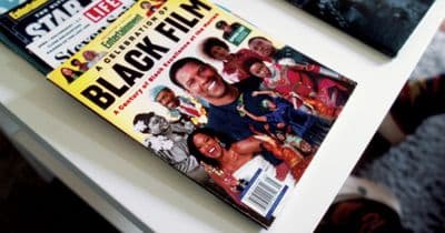 a magazine sitting on top of a white table