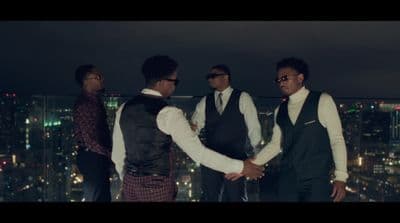 a group of men standing next to each other