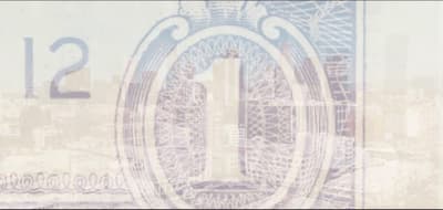 a close up of a one dollar bill with a city in the background