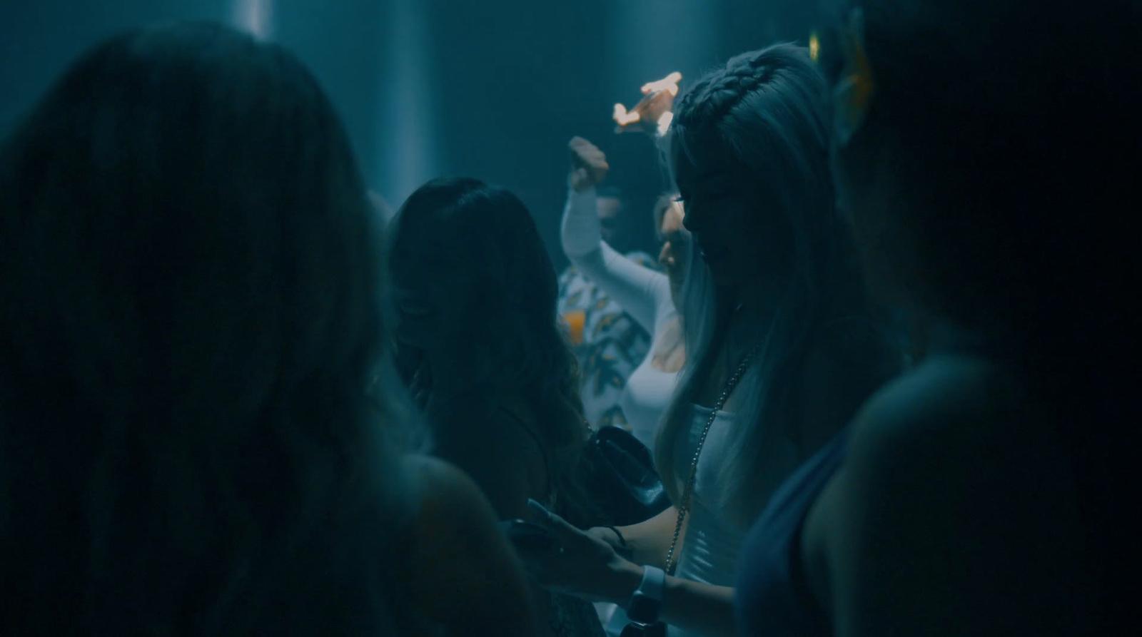 a group of women standing next to each other