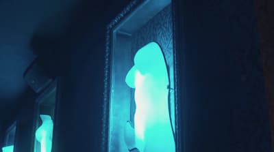 a reflection of a person in a mirror