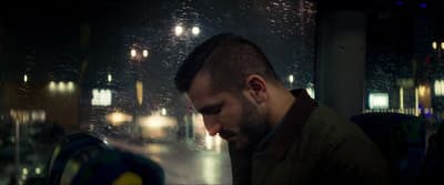 a man sitting on a bus