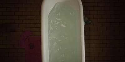 a bathtub filled with water in a bathroom