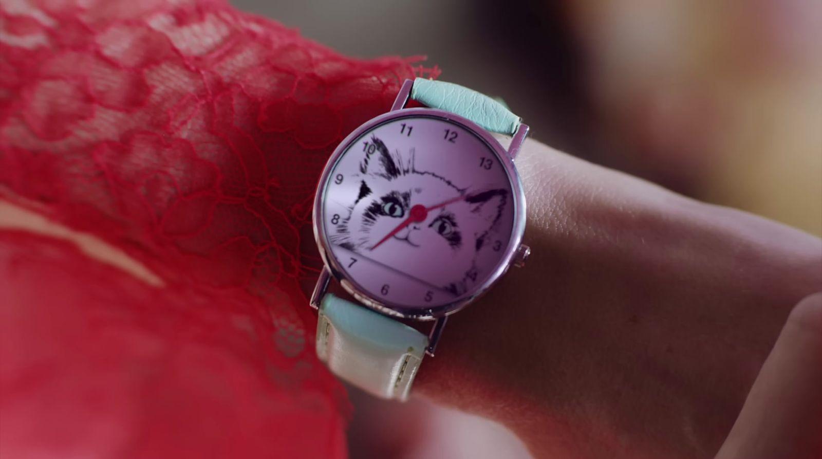 a close up of a person wearing a watch