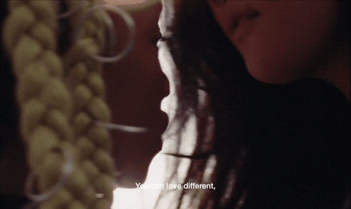 a close up of a person with long hair