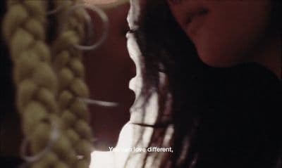 a close up of a person with long hair