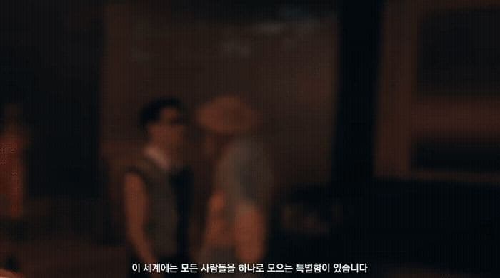 a couple of people standing in a room