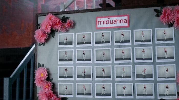 a calendar with pink flowers on a wall