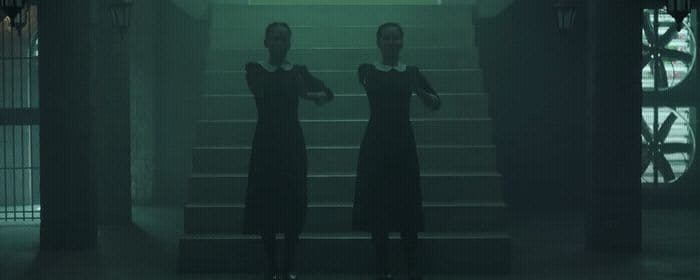 a couple of women standing next to each other