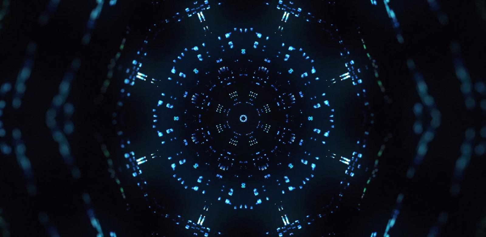 an abstract blue and black background with a circular design