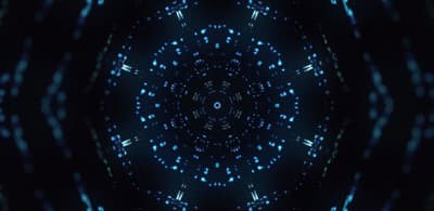 an abstract blue and black background with a circular design
