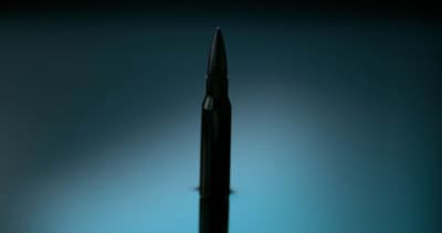 a black pen sitting on top of a table