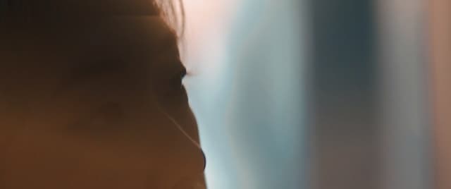 a blurry photo of a woman's face