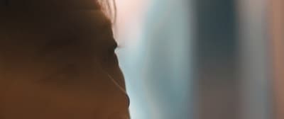 a blurry photo of a woman's face