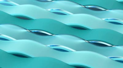 a close up of a row of blue chairs
