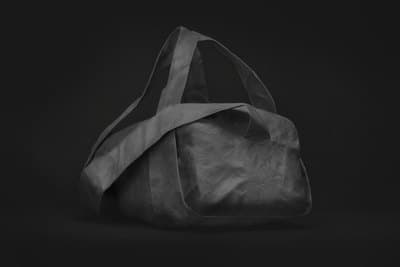 a black and white photo of a bag